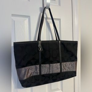 Black Coach tote with metallic embellishment